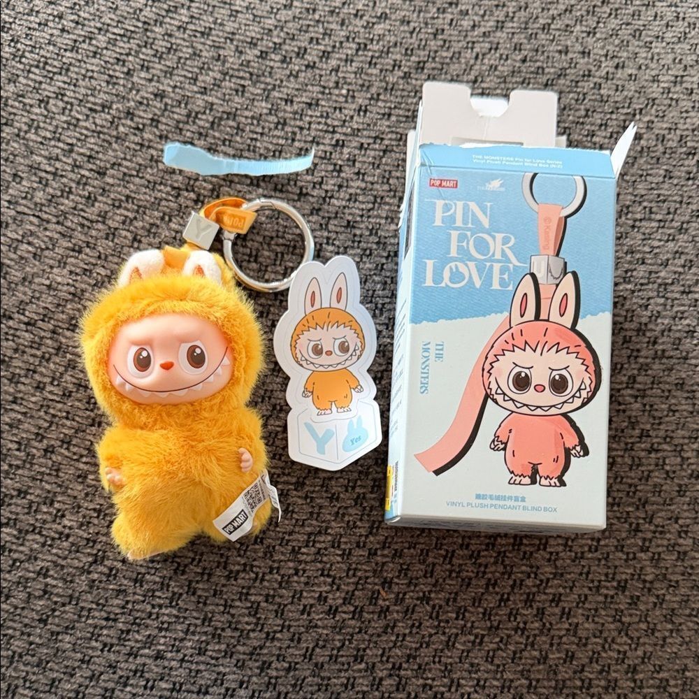 Popmart pin for love Y. Yellow